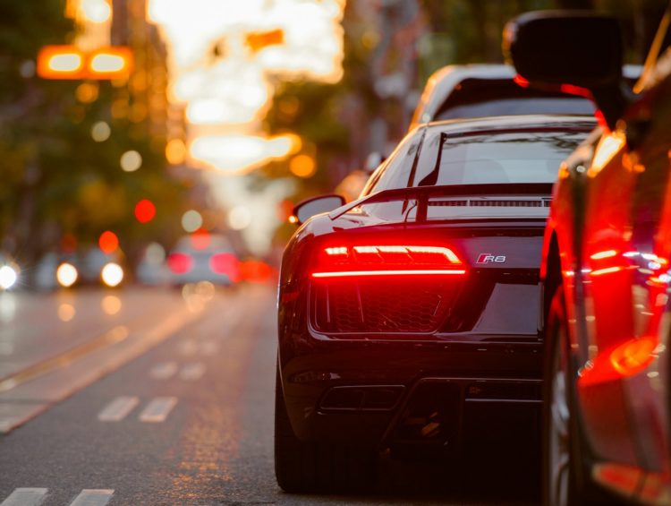 black Audi R8 parked beside road